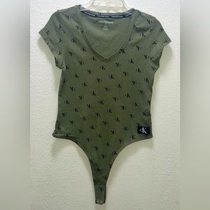CK Bodysuit Shirt in excellent condition in a sage green